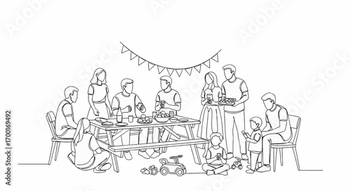 Large family gathered around a picnic table, enjoying a meal together.