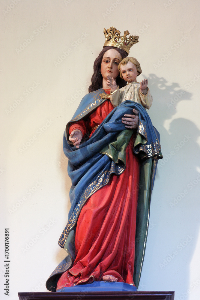 Fototapeta premium Our Lady of the Holy Rosary, statue in the parish church of the Immaculate Conception in Mace, Croatia