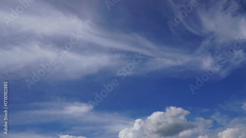 clouds and blue sunny sky,  white clouds over blue sky, Aerial view,  nature, blue sky, white clear weather. Time-lapse video 4 K.
