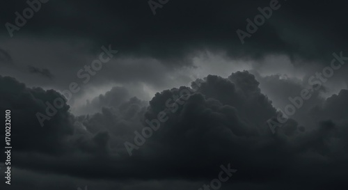 Dark, ominous storm clouds gathering in a turbulent and dramatic sky before a thunderstorm.