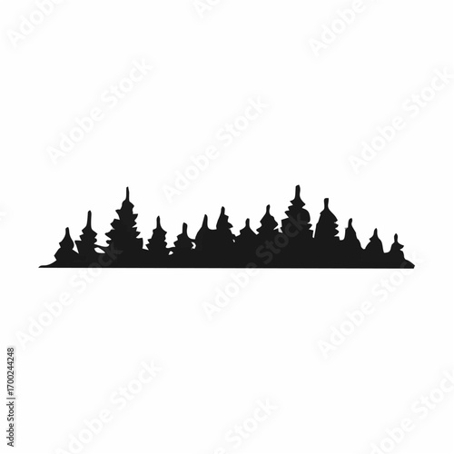 Silhouette of pine trees fore...