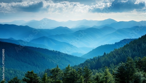 Forest Hills Under A Cloudy Sky Rolling Into Hazy Blue Mountains