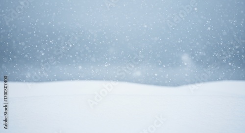Serene Winter Landscape with Gentle Snowfall: A Tranquil Scene of Snow-Covered Terrain and Falling Snowflakes in a Blue-Tinted Environment, Capturing the Calm Beauty of Winter