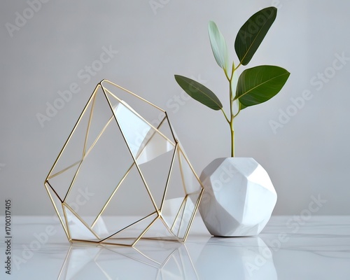 Sleek Gold Geometric Centerpiece Paired with Fresh Green Plant Element