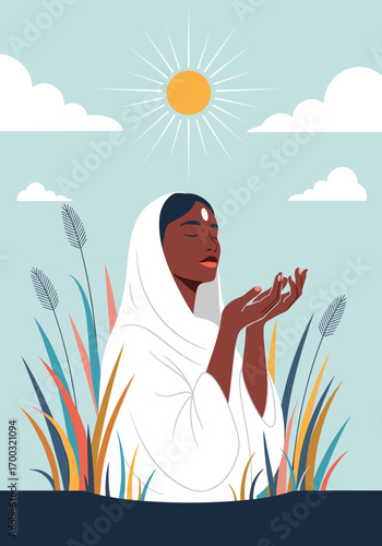 A woman praying under the sun in a field of reeds