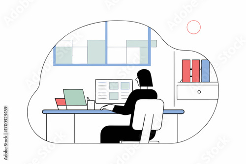 Business professional workng with a laptop in an offce environment.