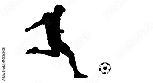 Silhouette of a soccer player kicking a soccer ball in mid-action.