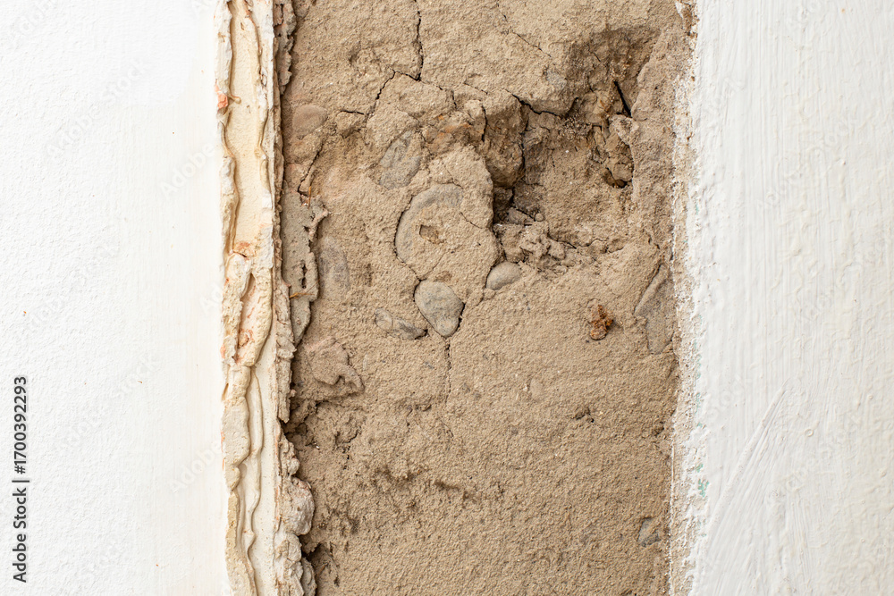 Demolition of a brick and cement wall , abstract textures with copy space Demolition of a brick and cement wall , abstract textures with copy space