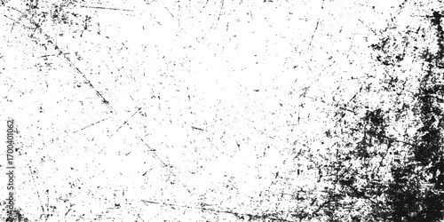 Abstract vintage black and white grunge texture with dirty paint splashes on an old rough paper surface