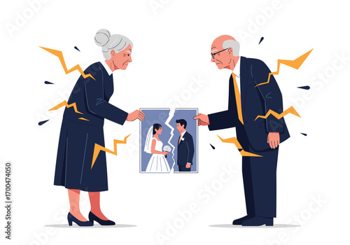 Elderly couple tearing wedding photo showing relationship trouble and marital discord