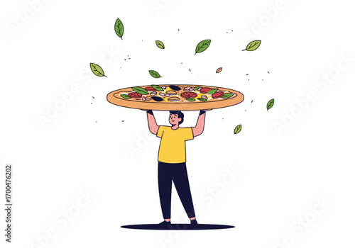 Man holding up a delicious healthy pizza adorned with fresh basil leaves flying around
