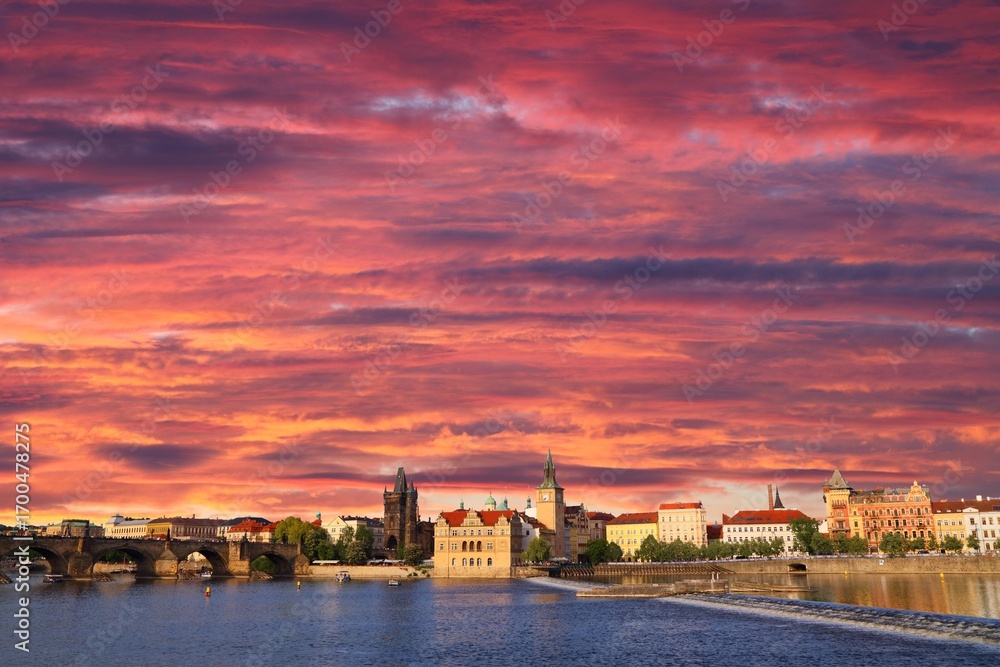 Obraz premium Skyline of River Vltava riverfront and Old Town (Stare Mesto) in Prague city, Czech Republic. Sunset light.