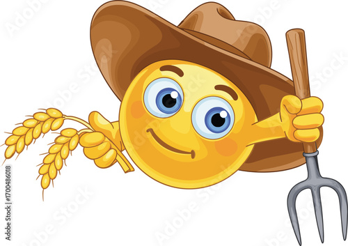 Smiley emoji dressed as farmer with wide-brimmed hat holding pitchfork and wheat, happy agricultural emoticon character, rural farming theme, countryside flat vector illustration