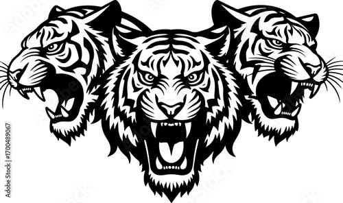 "Set of Roaring Tiger Head Silhouettes in Tribal Style