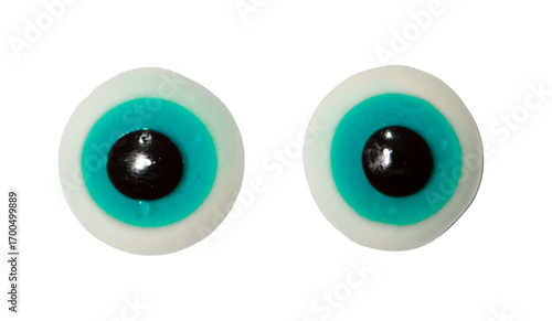 Two halloween gummy candy eyeballs with blue colors isolated on transparent background.