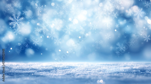雪原に舞う雪の結晶とやわらかなボケ光の冬景色背景