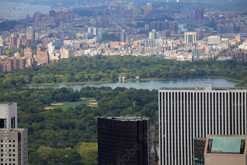 Aerial view of Central Park New York City green area with skyscrapers around