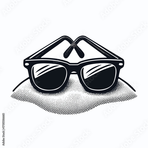 Classic black sunglasses on the sand in a retro engraved style. An isolated vector icon representing summer, beach life, and vacation