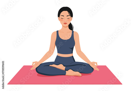 Woman in navy sportswear sits crosslegged in yoga lotus position on a pink mat with eyes closed