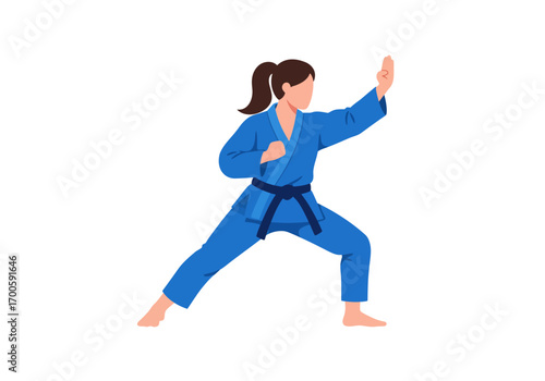 Woman in blue gi strikes a pose hands up black belt cinched ponytail feet bare