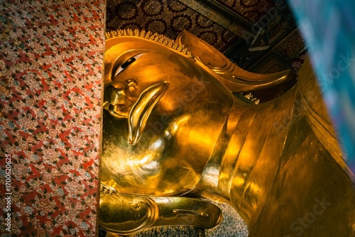 Fotografija Close-up of the Reclining Buddha statue at Wat Pho.