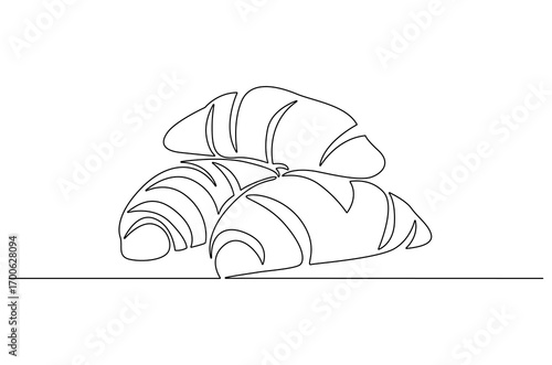 Continuous one line drawing of Croissant. Single line drawing illustration of Fresh baked croissant. French bakery concept vector art. Doodle line illustration.