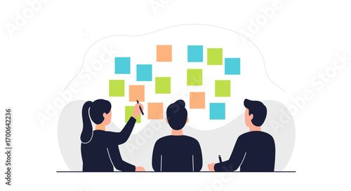 Creative team brainstorms ideas using colorful sticky notes on a planning board for project success.