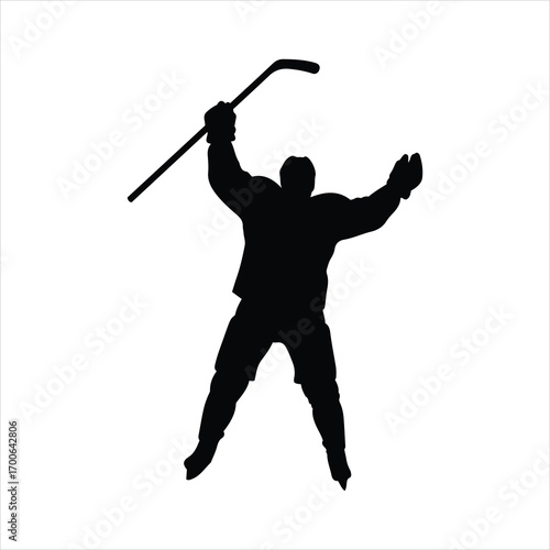 Excited hockey player silhouette celebrates victory with stick raised high