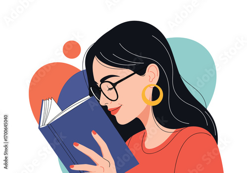 A woman with dark hair wearing glasses reads a book with an orange shirt and large hoop earrings