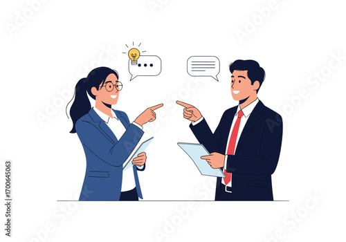 Two business professionals engaged in lively discussion sharing ideas through visual communication