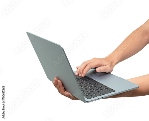 Side view of hands using modern laptop with customizable blank screen. Isolated on transparent PNG. Concept for technology, business, finance and advertising.