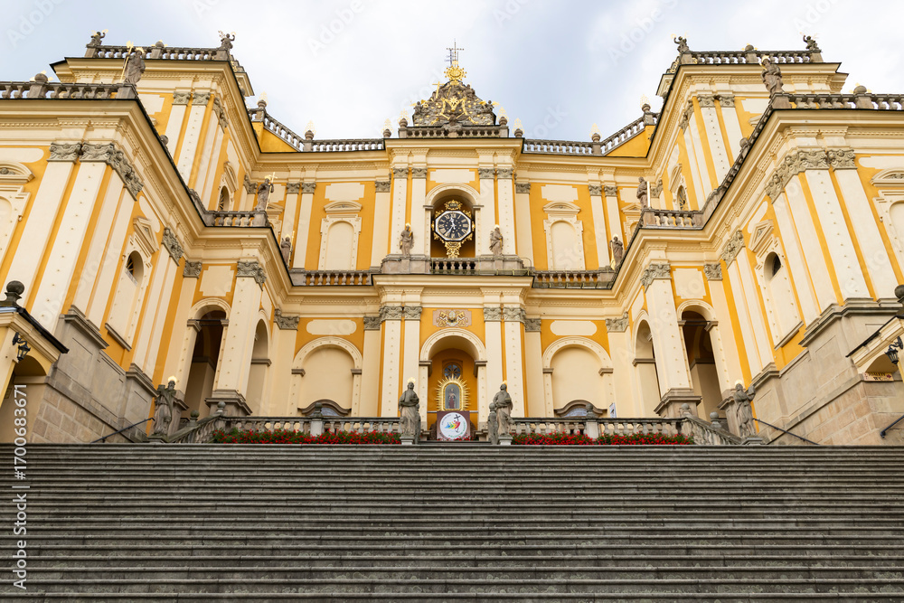 Obraz premium Basilica of the Visitation of the Blessed Virgin Mary in Wambierzyce, Poland, dominating the staircase