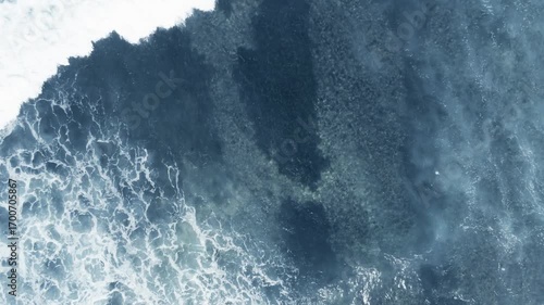 Top view of ocean waves at daytime on sunlight. Power of ocean concept