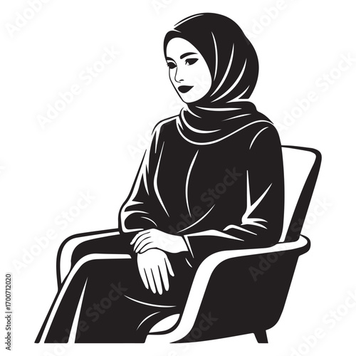 Elegant muslim woman wearing a black hijab and abaya sitting thoughtfully in a modern chair