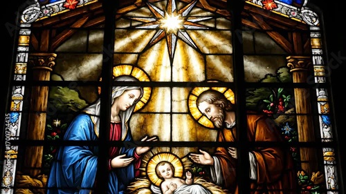 Stained Glass Nativity Scene - A stunning stained-glass window depicting the Nativity scene, showcasing the Holy Family—Mary, Joseph, and baby Jesus—illuminated by the bright Star of Bethlehem.