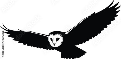 Majestic barn owl soaring through the air with outstretched wings, a stunning black and white silhouette, perfect for logos and branding