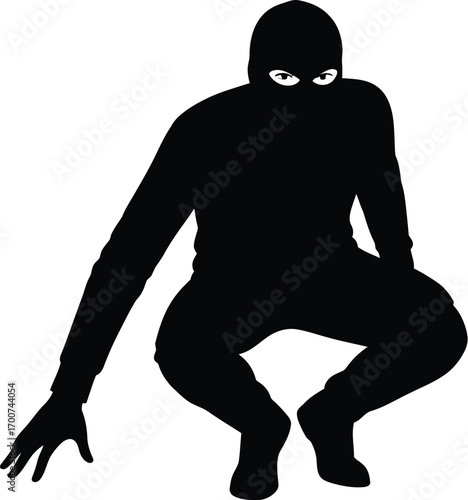 Silhouette of a mysterious figure in a ski mask crouching, perfect for crime, security, or suspenseful themes, creates instant intrigue