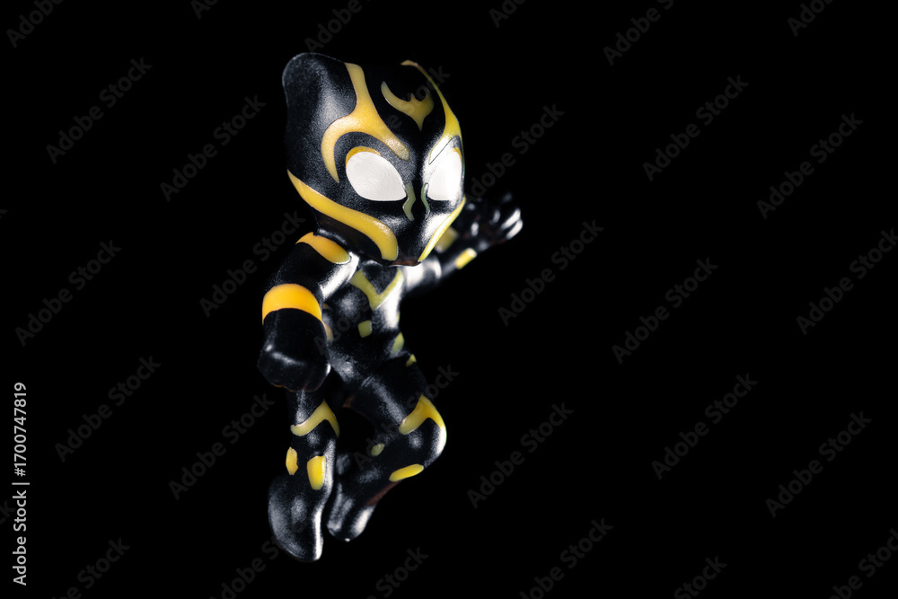 Naklejka premium Kinder Surprise Marvel Black Panther in a fighting position strikes in a jump