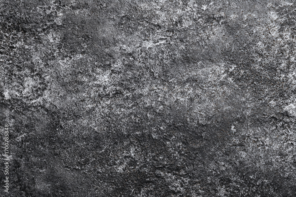 Naklejka premium Dark gray textured background with white speckles rough surface grunge design