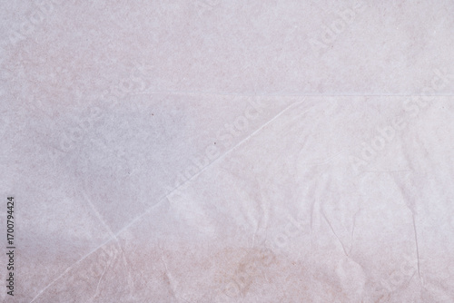 Wrinkled white tissue paper texture background
