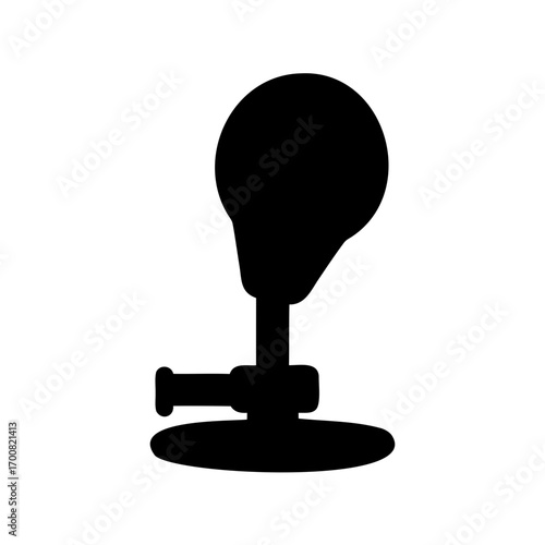 Silhouette of an old fashioned desk microphone with a round head