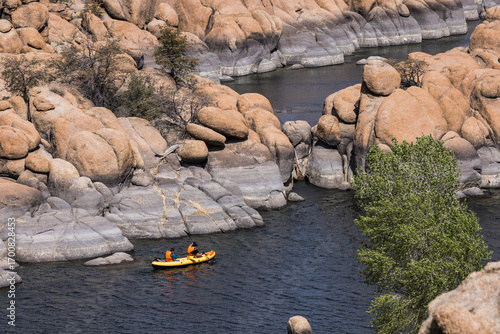 Kayaking Adventure at Watson Lake Surrounded by Granite Dells, Exploring Prescott Arizona’s Natural Beauty on a Sunny Afternoon