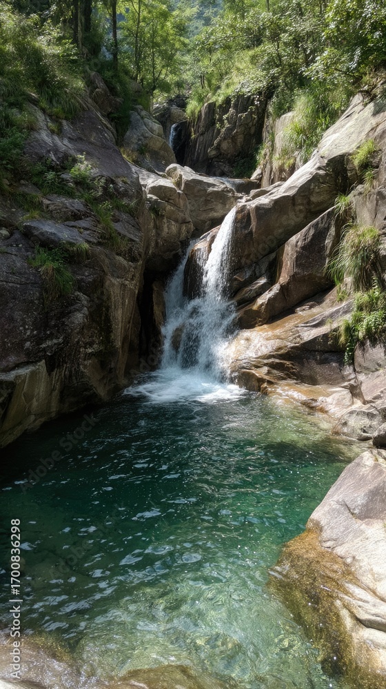 Fototapeta premium Serene waterfall cascades into a peaceful pool