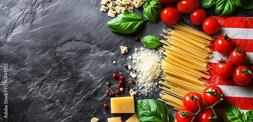Fresh Ingredients on a Black Stone Surface for an Italian Pasta Dish Preparat...