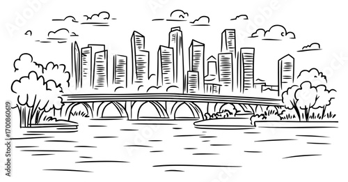 Downtown waterfront skyline viewed over arched river bridge, reflected towers at golden hour