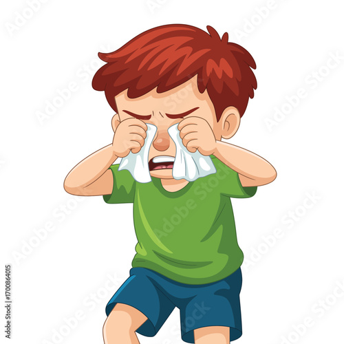 Young boy crying and wiping tears with a tissue