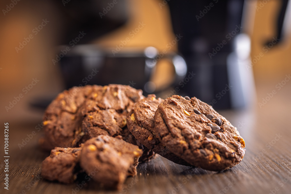 Fototapeta premium Sweet chocolate cookies on wooden table.