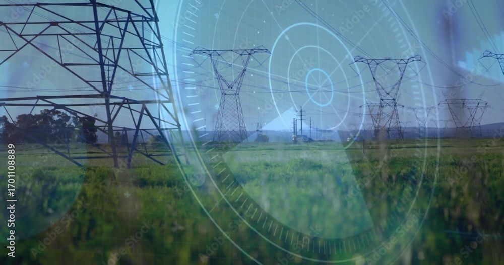 Fototapeta premium Displaying steel lattice transmission towers spanning grass field, overlaying circular digital HUD