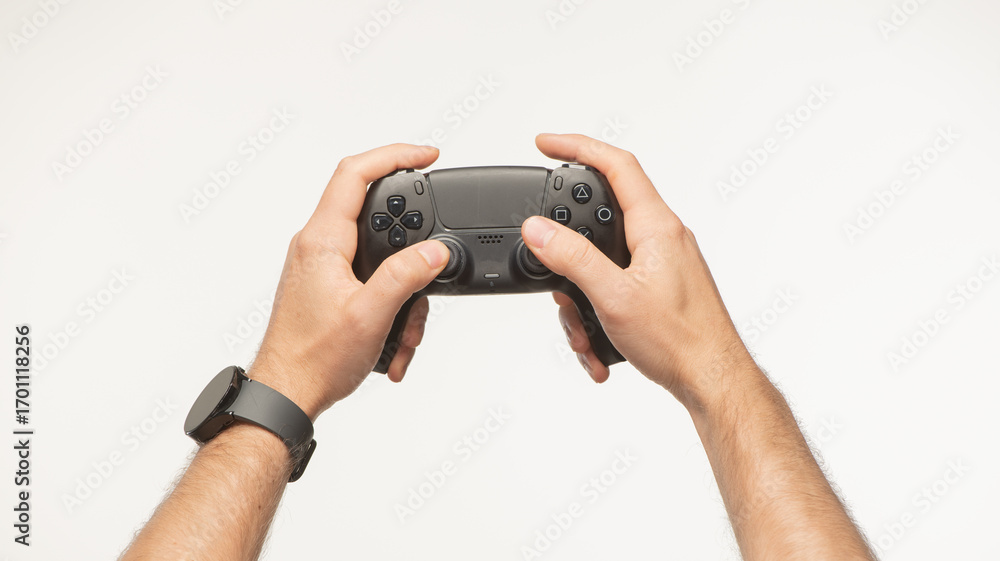 Fototapeta premium male hands with joystick on white background