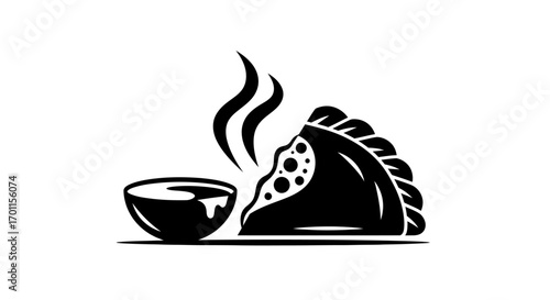 A steaming hot savory pastry served with a small bowl of sauce.